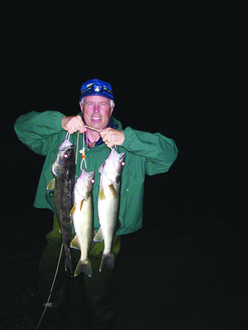 An angler shows his successful attempt at Fishing the Finger Lakes for walleye